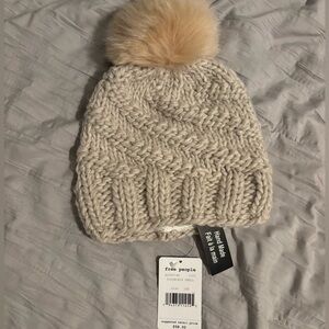Free People Pom Hat, Cream/Off-white color.
New with tags.